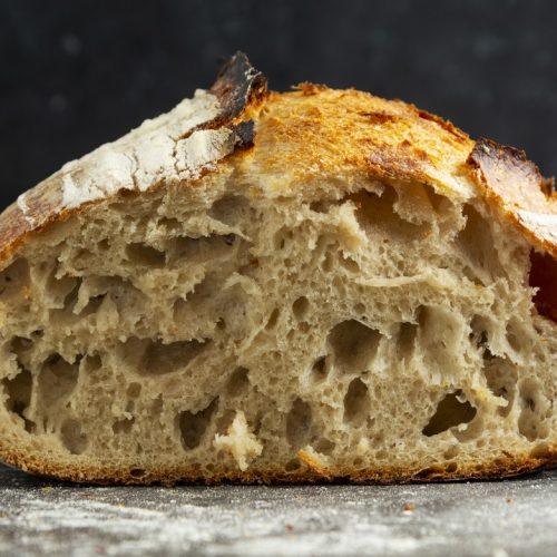 Sourdough rustic homemade healthy bread. Traditional bread, home baking.