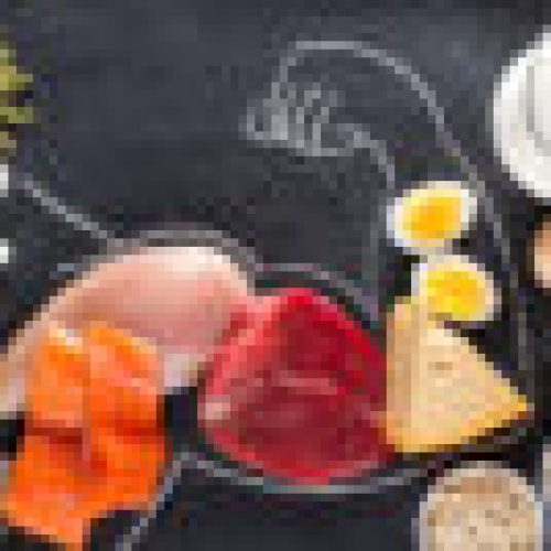 High protein food for body builders as meat, fish, dairy, eggs, buckwheat, oatmeal, nuts, bean, pumpkin seed and sunflower seed. Top view.